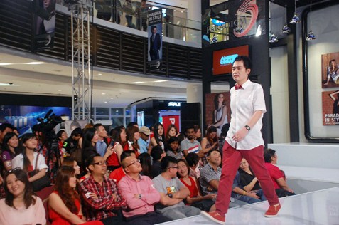 Ralph Tan on the catwalk among those who participated