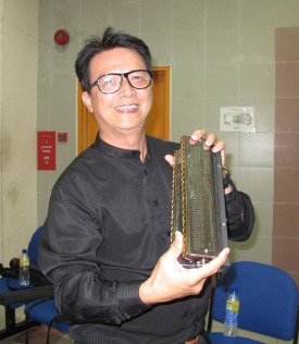 Mr Tang plays several instruments including the cello 