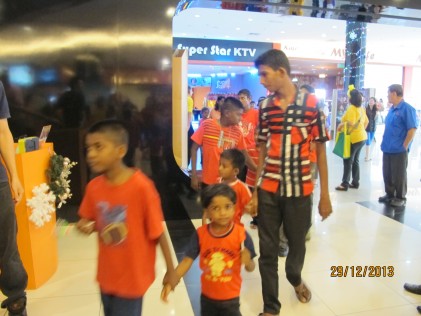 Children lining up to enter the cinema to watch the Disney movie FROZEN