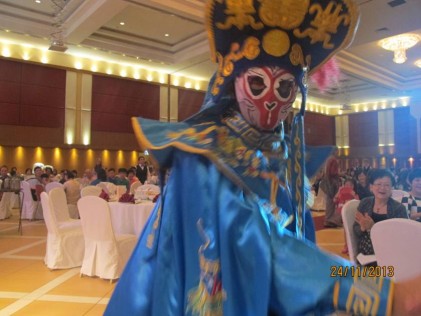 The Chinese mask changing artiste captivating  the audience