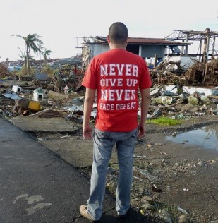 A volunteer looks on 