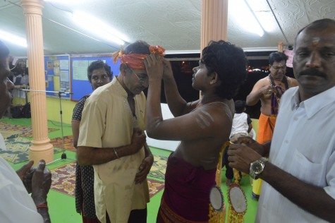 Inderjit receving the head scraf