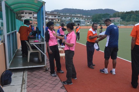 Annie and Norhafizah discussing technical points