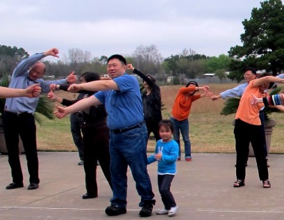 Young and old participating in the Laughter exercises