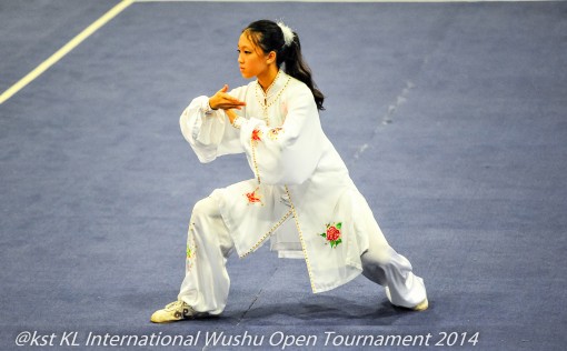 A female participant in the Taiji category