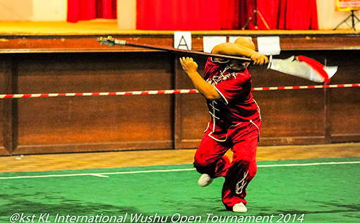 An competitor from Henan Province in China competing in the weapons category with a Kuantow (Long sword)