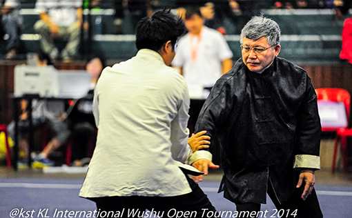 Mr Ling Eng Chan, the President of the KL Wushu Federation competing in the Dual Fist Fighting Event