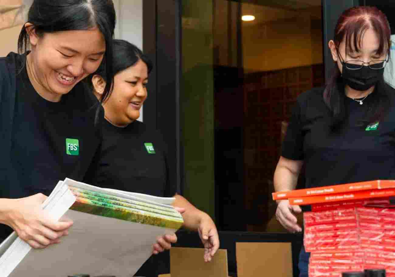 Dedicated volunteers from Suka Society and FBS prepare educational materials for Orang Asli children in Malaysia, promoting access to quality education.