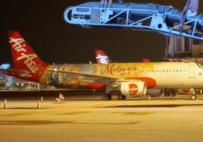 AirAsia flight makes emergency landing after engine fire
